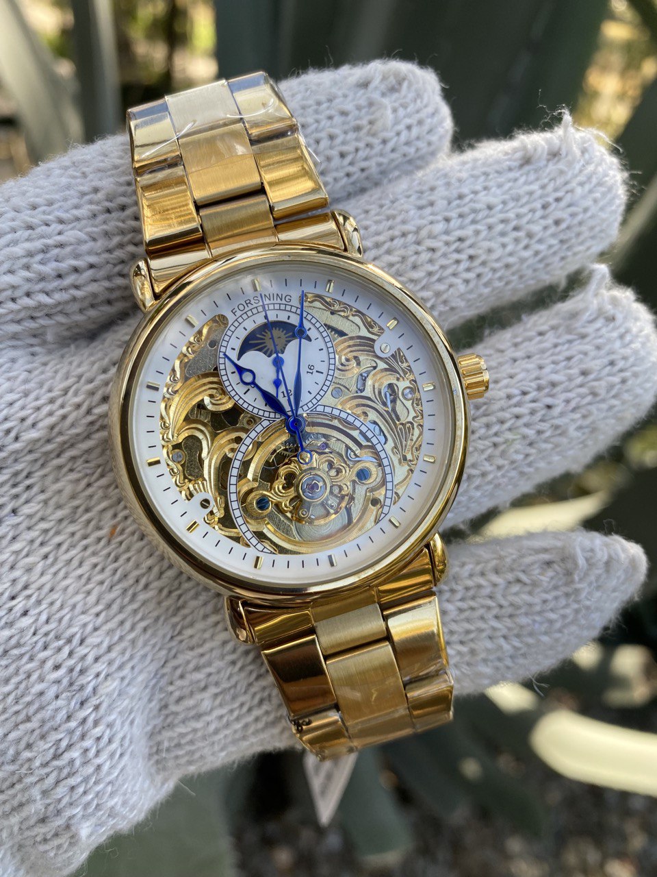 FORSINING AUTOMATIC MOONPHASE SKELETON WATCH.