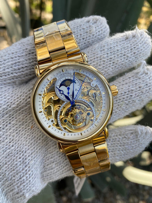 FORSINING AUTOMATIC MOONPHASE SKELETON WATCH.