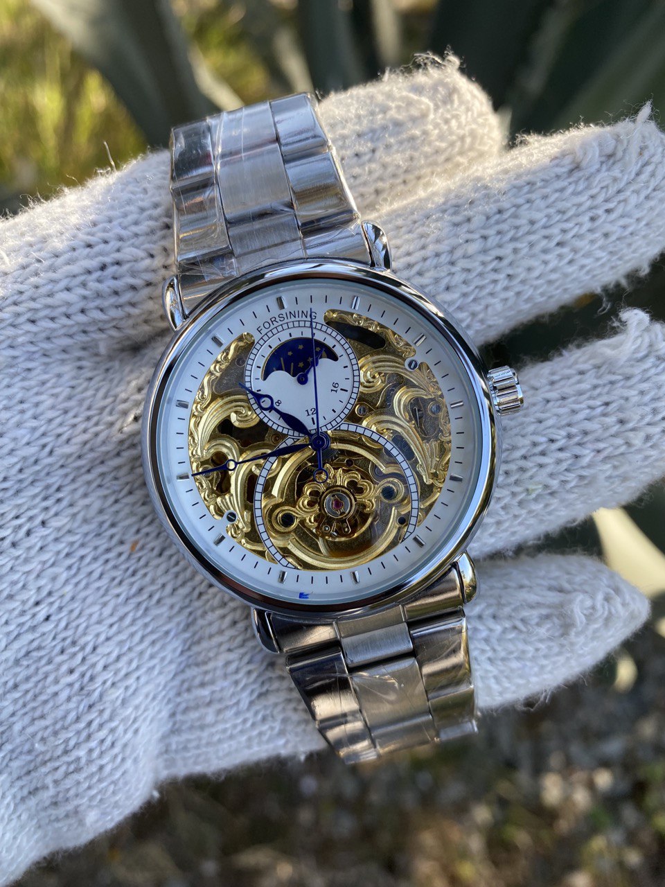 FORSINING AUTOMATIC MOONPHASE SKELETON WATCH.