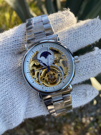 FORSINING AUTOMATIC MOONPHASE SKELETON WATCH.