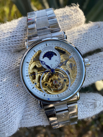 FORSINING AUTOMATIC MOONPHASE SKELETON WATCH.